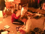Ben, Anna Beth, and Ginny opening presents